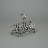 Victorian Silver Seven-Bar Toast Rack, Charles Reily & George Storer, London, 1847, length 6.9 in —