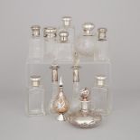 Twelve Mainly Silver Mounted Glass Perfume and Toilet Water Bottles and Jars, 20th century, largest