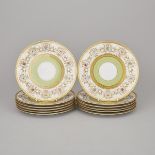 Twelve Charles Ahrenfeldt, Limoges Floral and Gilt Decorated and Apple Green Banded Dessert Plates,