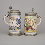 Two German Pewter Mounted Faience Steins, late 18th century, height 10.4 in — 26.5 cm; 9.8 in — 24.8