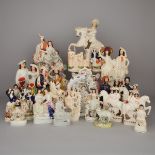 Collection of Twenty-Seven Staffordshire Pottery Figures, Groups and Spill Vases, mainly second half