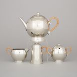 Four Piece Contemporary Nick Munro Pewter Tea Service, late 20th century, height 7.5 in — 19.1 cm