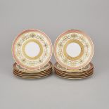 Twelve Charles Ahrenfeldt, Limoges Floral and Gilt Decorated and Pink Bordered Dessert Plates, 20th