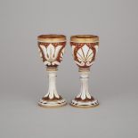 Pair of Bohemian Overlaid, Cut and Gilt Red Glass Goblets, late 19th century, height 7.5 in — 19 cm