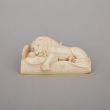 Swiss Carved Ivory Model of the Lion of Lucerne, 19th century, length 3 in — 7.6 cm