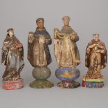 Four Spanish Colonial Santos Figures, 18th/19th century, tallest height 14 in — 35.6 cm (4 Pieces)
