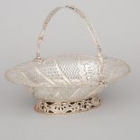 George III Silver Oval Cake Basket, London, 1767, length 14.2 in — 36 cm