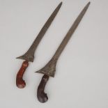Two Javanese Kris Daggers, 19th/early 20th century, longest height 17.5 in — 44.5 cm (2 Pieces)