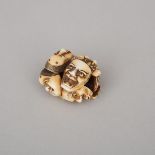 An Ivory Carved Netsuke of Noh Masks, Meiji Period, 明治時期 牙雕'能'面具墜子, length 1.6 in — 4 cm