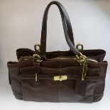 Coach Brown Leather Two Handle Handbag, serial #G1173-17811; with brass hardware; 14"L; 9"H; with or