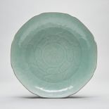 A Celadon-Glazed 'Lotus' Dish, 18th Century, 十八世紀 粉青釉蓮瓣盤, diameter 14.4 in — 36.7 cm