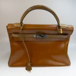 Hermes Kelly Top Handle Gold Leather Bag, 32 cm.; date letter 'Z' for 1970