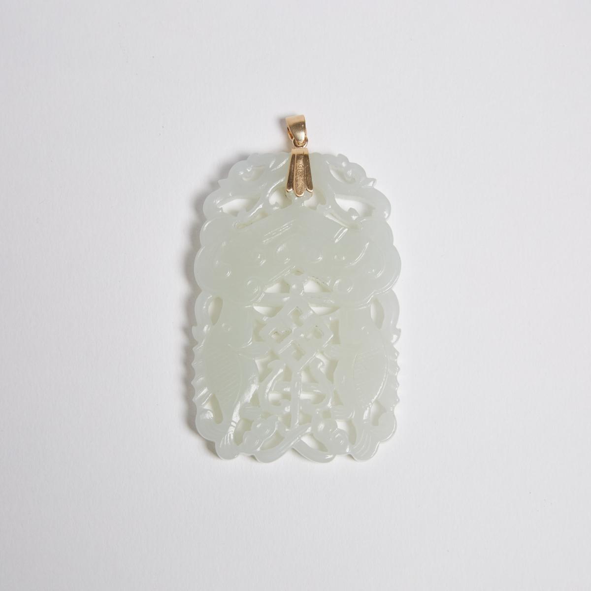 A White Jade Reticulated 'Double-Fish' Plaque, 白玉透雕'吉慶有餘'珮, length 2.5 in — 6.3 cm - Image 2 of 2