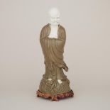 A Glazed Ceramic Figure of Bodhidharma, 綠釉達摩立像, height 22 in — 55.9 cm