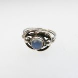 Georg Jensen Danish Sterling Silver Ring, bezel set with a circular moonstone cabochon; #5