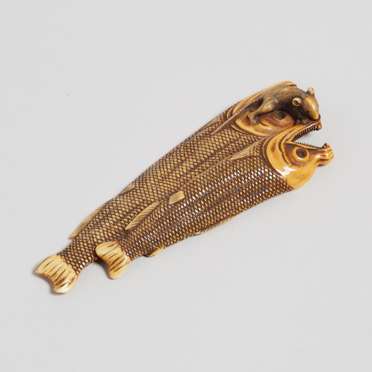 An Ivory Netsuke of a Rat on Two Dried Salmon, 19th Century, 十九世紀 牙雕鼠臥三文魚根付, length 4.3 in — 11 cm