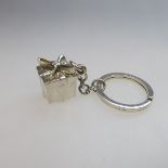 Tiffany & Co. Sterling Silver Key Ring, formed as a suspended present; with the original pouch