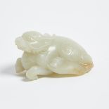 A White and Russet Jade Carved Qilin, 白玉臥麒麟, length 3.5 in — 8.9 cm