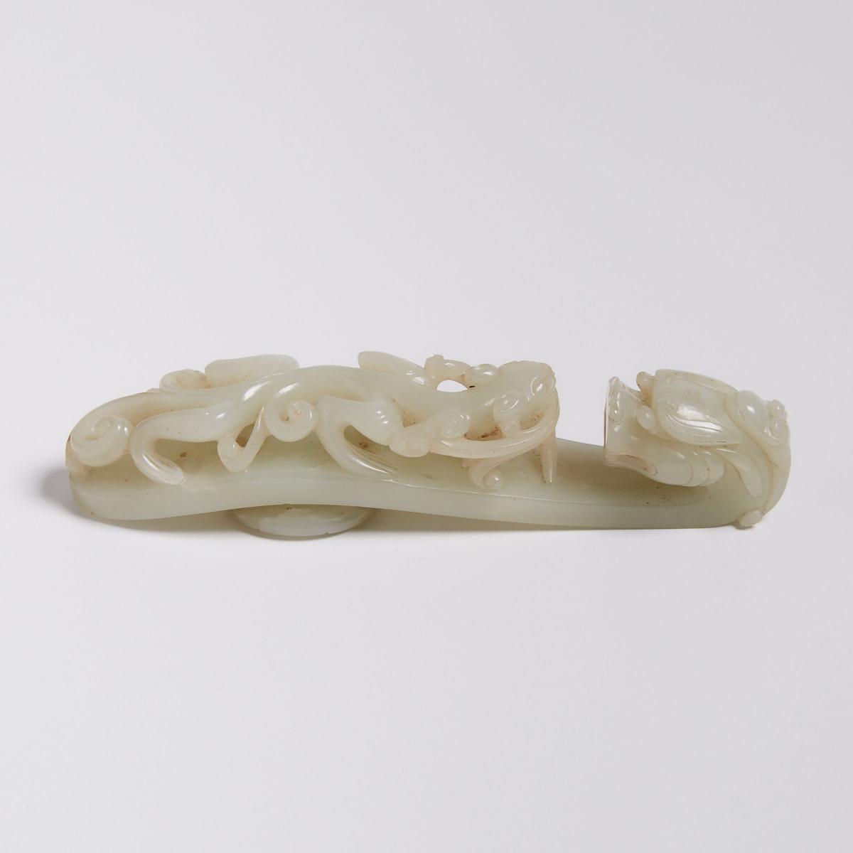 A Celadon White Jade Chilong Belt Hook, 青白玉蒼龍教子帶鉤, length 5.4 in — 13.6 cm - Image 2 of 2