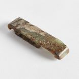 A Celadon and Russet Jade Scabbard Slide, Han Dynasty, 勾雲紋玉帶鉤, length 4 in — 10.2 cm