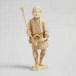 A Bone Carved Okimono of a Farmer, Early 20th Century, 二十世紀早期 骨雕漁夫立像, height 9 in — 22.9 cm