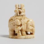 An Ivory Carved 'Elephant and Karako' Group Okimono, 19th Century, 十九世紀 牙雕象唐子擺件, 2.6 x 2 in — 6.5 x