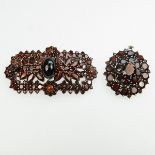 Two Czech Sterling Silver Brooches, each set with numerous cut garnets