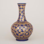 A Powder-Blue and Gilt-Decorated 'Medallion' Bottle Vase, Guangxu Mark and Period (1875-1908), 清光緒 洒