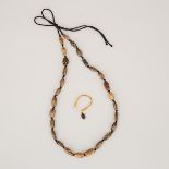 A Necklace of Twenty-Seven Inro Beads, 日本明治時期 金工緒締27點, length 11.8 in — 30 cm