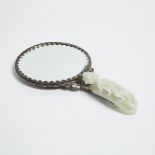 A Pale Celadon Jade-Mounted Hand Mirror, Qing Dynasty, 清 銀掐絲琺琅蝠壽紋嵌青白玉手鏡, length 9.4 in — 24 cm