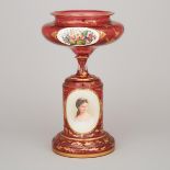 Bohemian Overlaid, Enameled and Gilt Red Glass Portrait Comport, late 19th century, height 14.5 in —