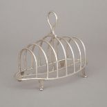 Late Victorian Silver Seven-Bar Toast Rack, Henry Wigfull, Sheffield, 1899, length 7.4 in — 18.7 cm