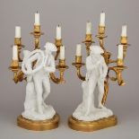 Pair of French Louis XV Style Ormolu and Parian Figural Candelabra, mid 20th century, height 19 in —