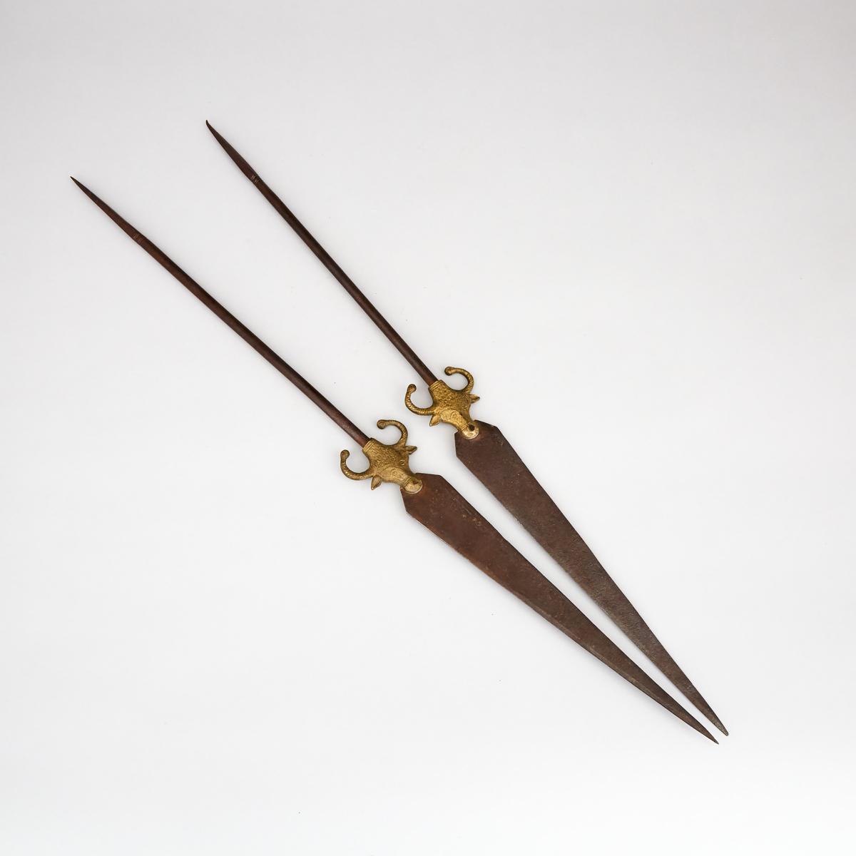 Pair of Bronze Bull Head Mounted Iron Lances/Skewers, early 20th century, length 26 in — 66 cm (2 Pi
