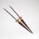 Pair of Bronze Bull Head Mounted Iron Lances/Skewers, early 20th century, length 26 in — 66 cm (2 Pi