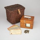 Plasschaert Pigeon Race Clock and Basket, early 20th century, basket height 9.5 in — 24.1 cm (2 Piec