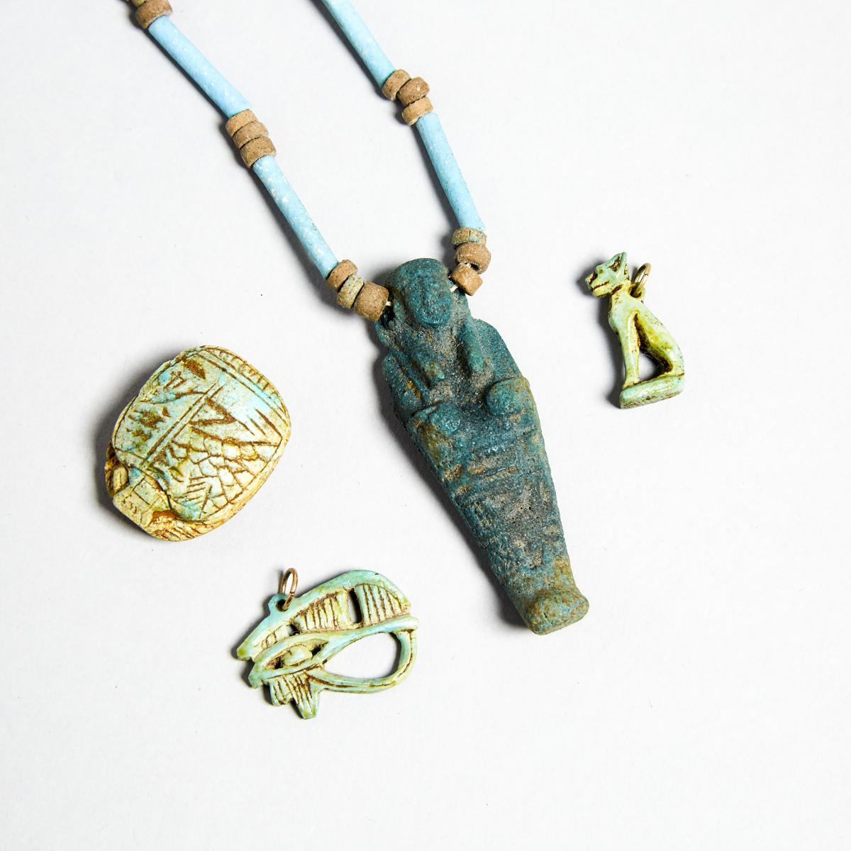 Group of Egyptian Turquoise Faience Amulets and Beads, New Kingdom to Late Period, 1550-332 B.C., sh - Image 2 of 3