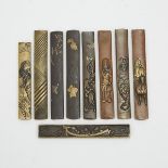 A Group of Nine Kozuka, Meiji Period, 日本 明治時期 合金小柄一組九件, longest length 3.8 in — 9.7 cm (9 Pieces)