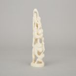 A Carved Ivory Monkey Group, Early 20th Century, 二十世紀早期 牙雕群猴摘桃擺件, height 8.7 in — 22.2 cm