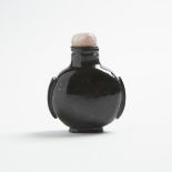 A Black Hardstone Carved Snuff Bottle, 黑硬石鼻煙壺, height 2.6 in — 6.6 cm