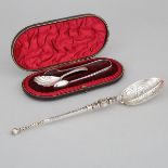 Victorian Silver Anointing Spoon, Caddy Spoon and Sugar Tongs, London, 1876 and 1893, largest length