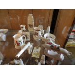 11 pieces of crested china, including Carlton “Shrapnel Villa. Tommy’s dugout somewhere in