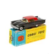 Corgi Toys Ford Thunderbird (214S). In metallic dark grey with red roof and yellow interior. With