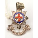 An officer’s enamelled cap badge of The R Sussex Regt, marked L& Co, Sterling. Basically GC (red