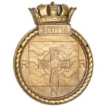 A cast brass circular badge of HMS Scotia, RNR base, Rosyth, formerly a WWII training establishment,