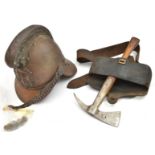 A brass helmet of the Kingston & Surbiton Fire Brigade, large back peak, ornamental comb, “KSFB”