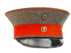 An Imperial German Baden General’s peaked cap (feldmutze), with field grey crown, scarlet band and
