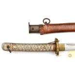 A WWII Japanese NCO’s sword katana, blade 27½”, with back fuller, no. 133524, pierced brass tsuba,