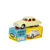 Corgi Toys Jaguar 2.4 Litre Saloon (208S). An example in lemon yellow with red interior, smooth