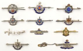 7 enamelled silver sweetheart tie pins: RA (2), Geo VI RE, R Sussex (3) and Hampshire; non enamelled